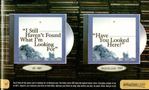 Two compact disc cases hover in front of a shelf of compact discs. The text on one case says I still haven't found what I'm looking for. You too. The other says have you looked here? Amazon dot com. 